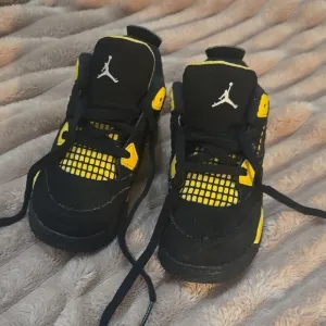 Kids Black and Yellow Jordan Shoes