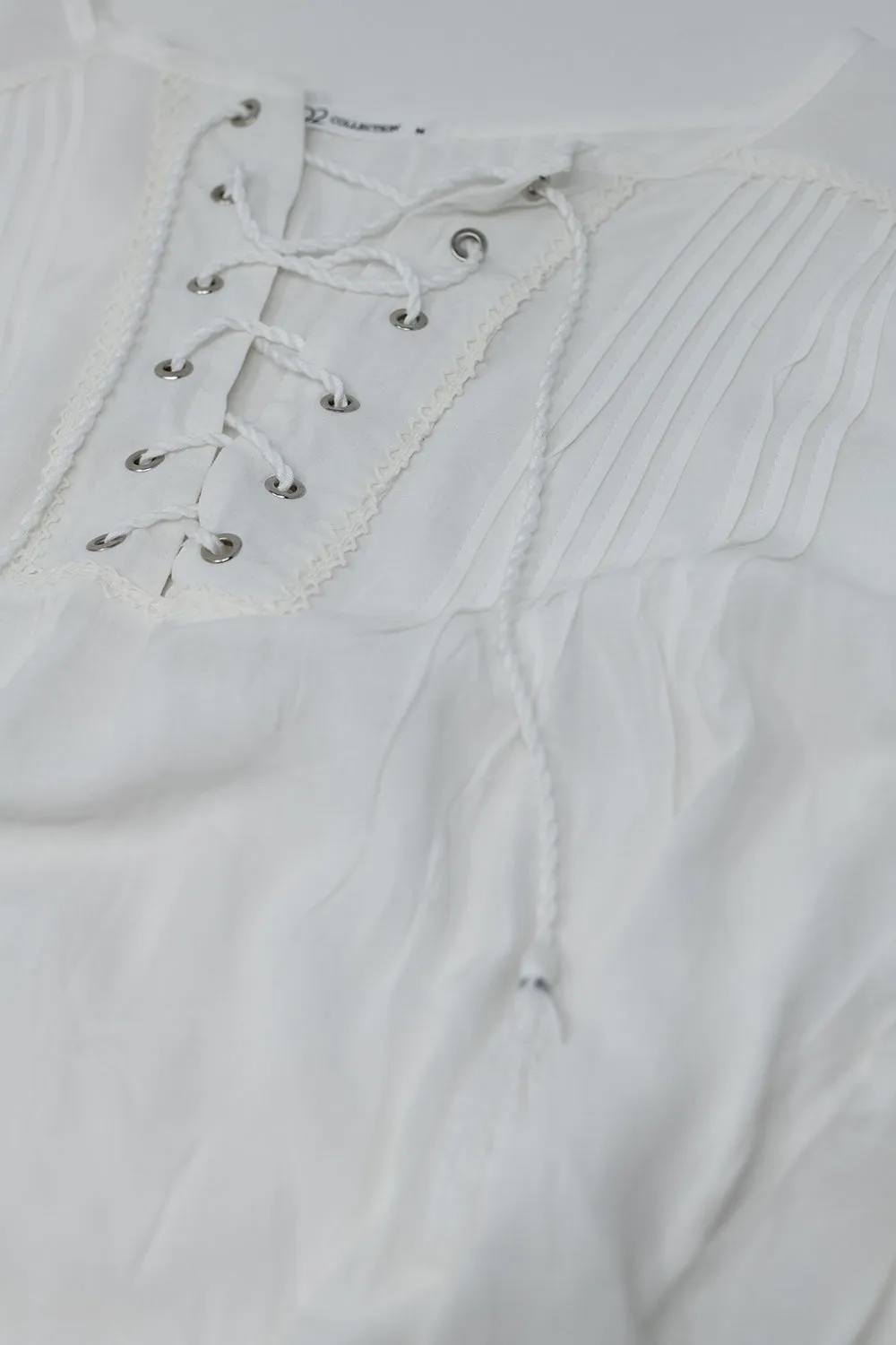 White Shirt With Tassel Ends and cross tie closure